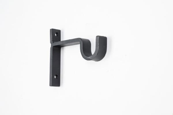 The Classic Center Support Bracket is a black metal wall bracket with a hook shape, featuring two screw holes, shown on a white background.