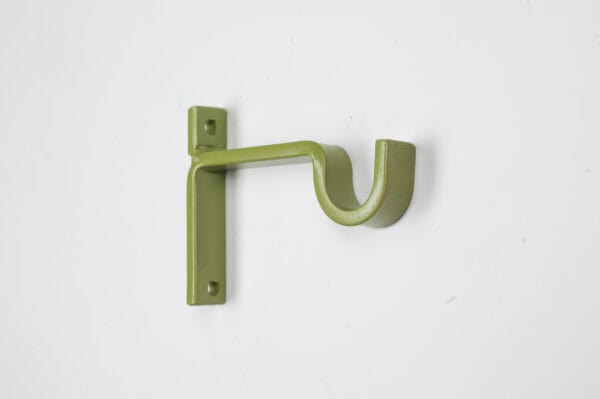 The Classic Center Support Bracket is a green metal wall mount with a curved hook design and two screw holes, shown on a white surface.