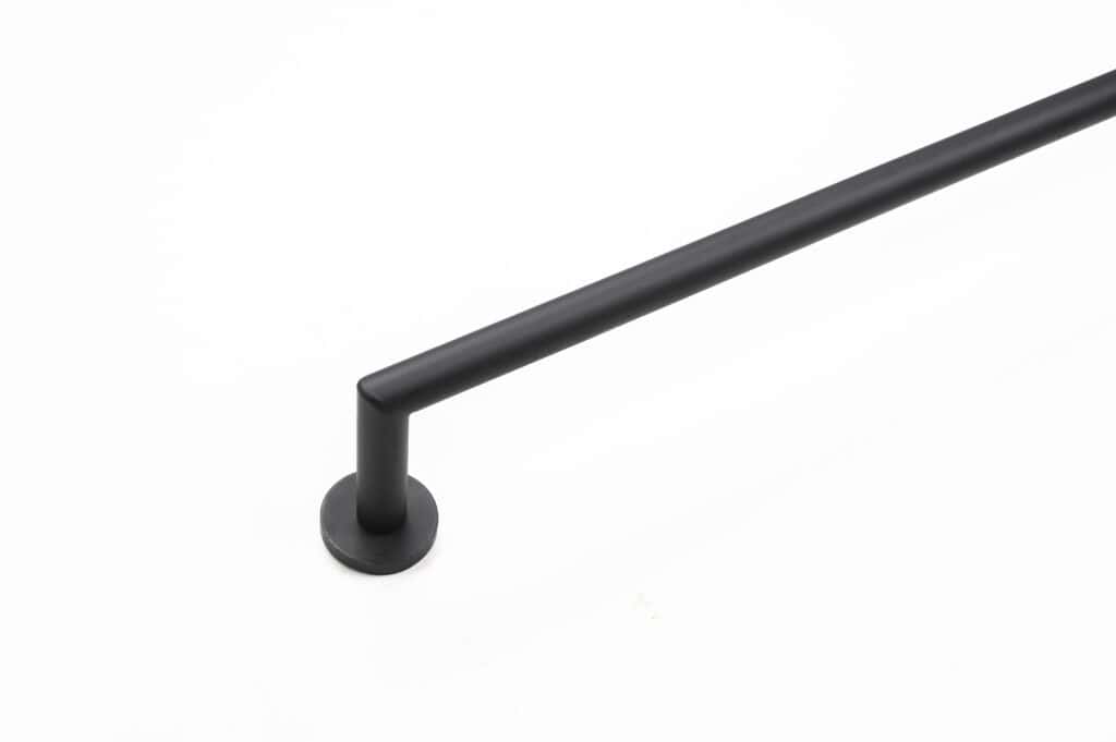 Black metal towel bar mounted on a white wall.