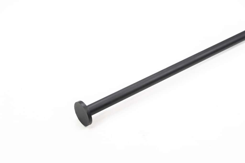 Black metal rod with a flat circular end, set against a white background.