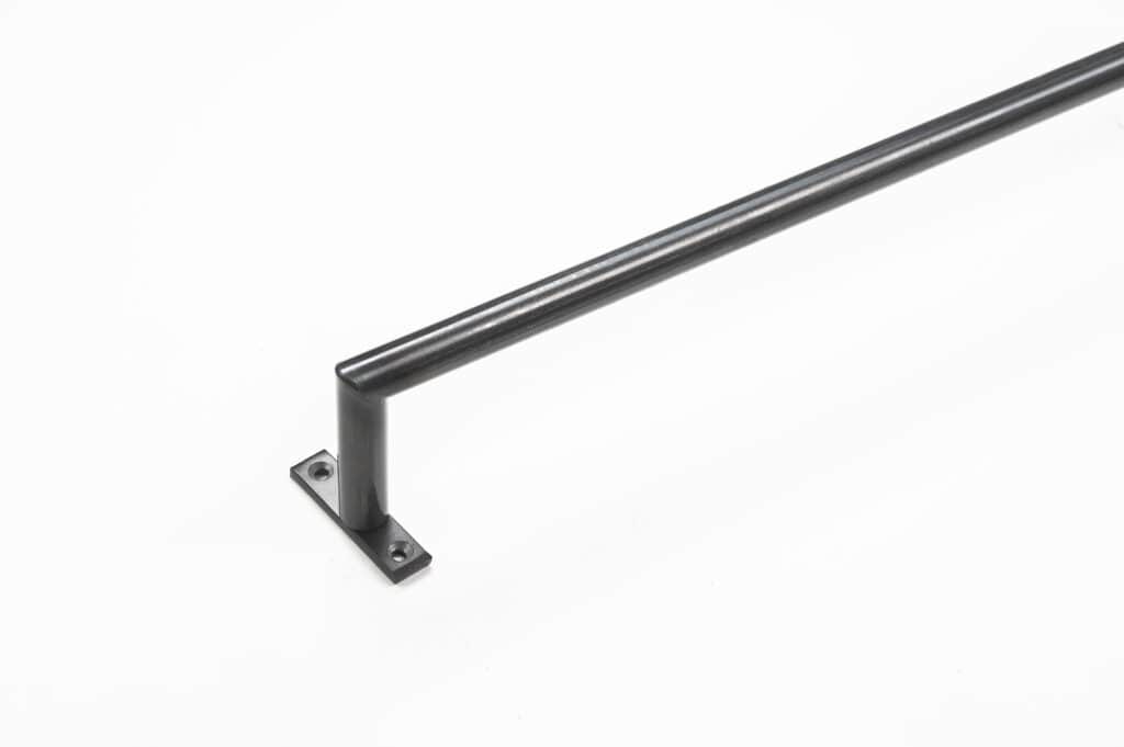 A black metal handrail with a right angle, mounted on a flat base with two screw holes, is shown against a white background.