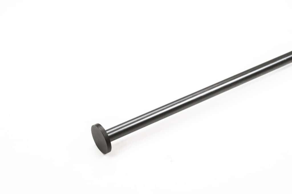 A black metal rod with a flat circular end, photographed on a white background.